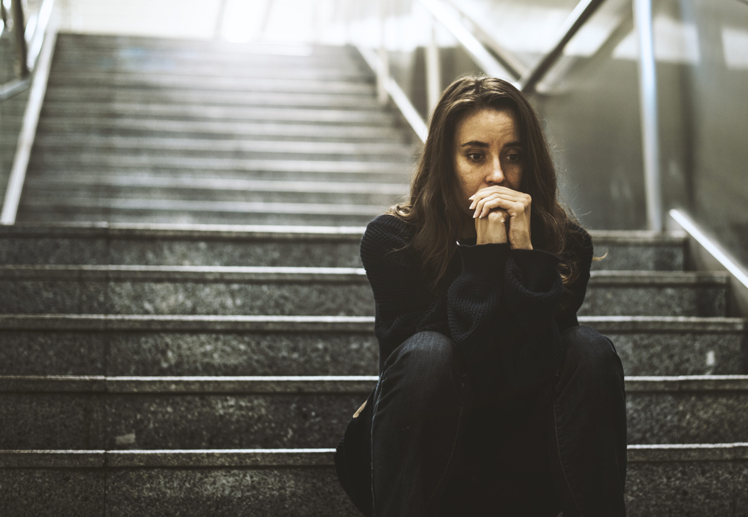 Adult Woman Sitting Look Worried on The Stairway